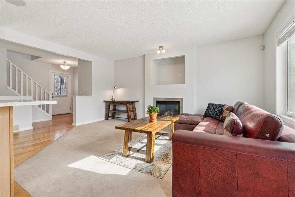 85 Silverado Range View Sw, Calgary, AB - Indoor Photo Showing Living Room With Fireplace