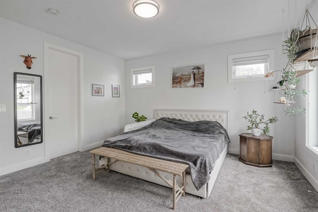 701 13A Street Ne, Calgary, AB - Indoor Photo Showing Bedroom