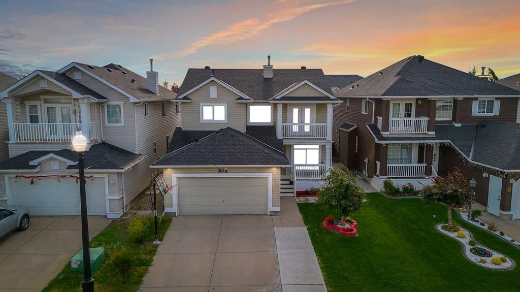 51 Coral Reef Close Ne, Calgary, AB - Outdoor With Balcony With Facade