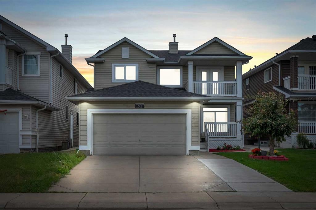 51 Coral Reef Close Ne, Calgary, AB - Outdoor With Balcony With Facade