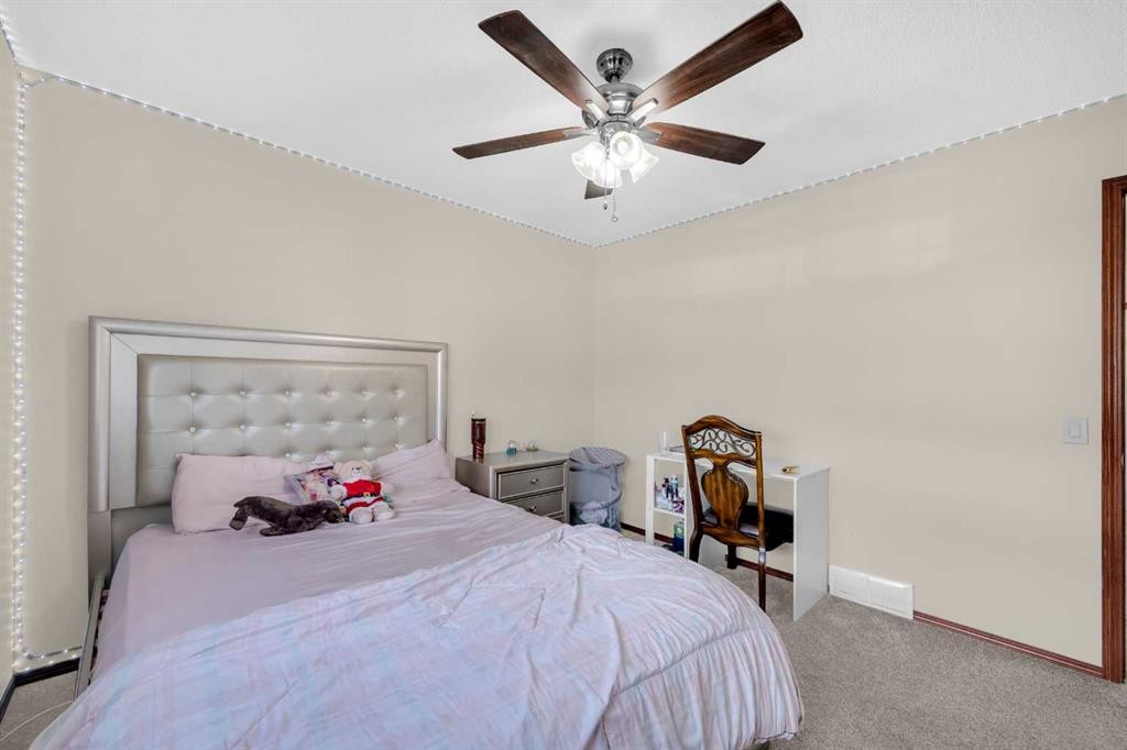 51 Coral Reef Close Ne, Calgary, AB - Indoor Photo Showing Bedroom
