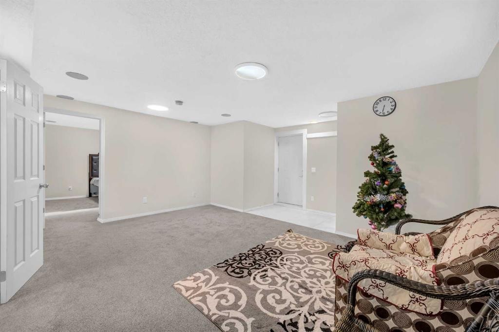 51 Coral Reef Close Ne, Calgary, AB - Indoor Photo Showing Other Room