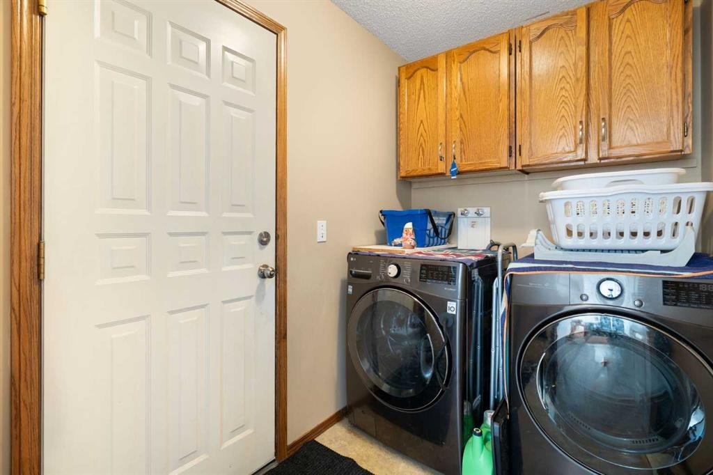 80 Chaparral Road Se, Calgary, AB - Indoor Photo Showing Laundry Room