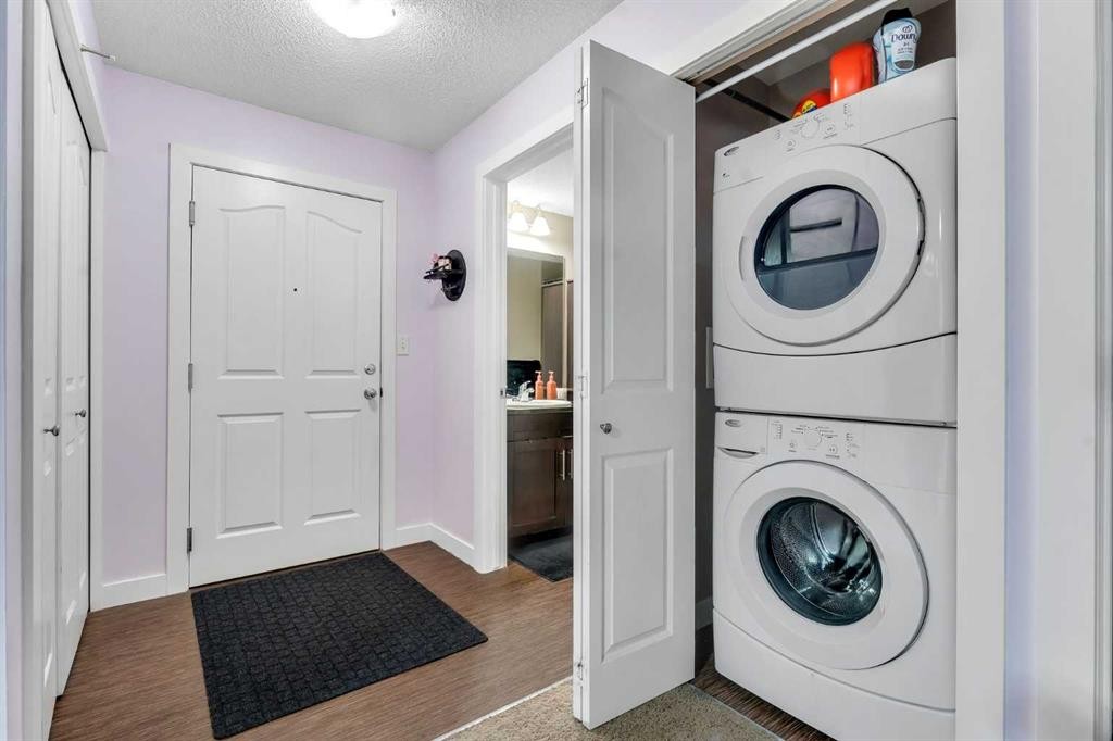 318-7210 80 Avenue Ne, Calgary, AB - Indoor Photo Showing Laundry Room