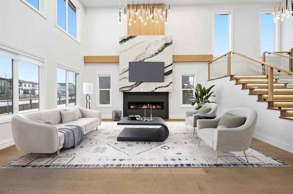126 Sunstone Way, Balzac, AB - Indoor Photo Showing Living Room With Fireplace