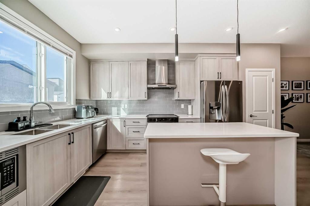 455 Tekarra Drive Nw, Calgary, AB - Indoor Photo Showing Kitchen With Stainless Steel Kitchen With Double Sink With Upgraded Kitchen