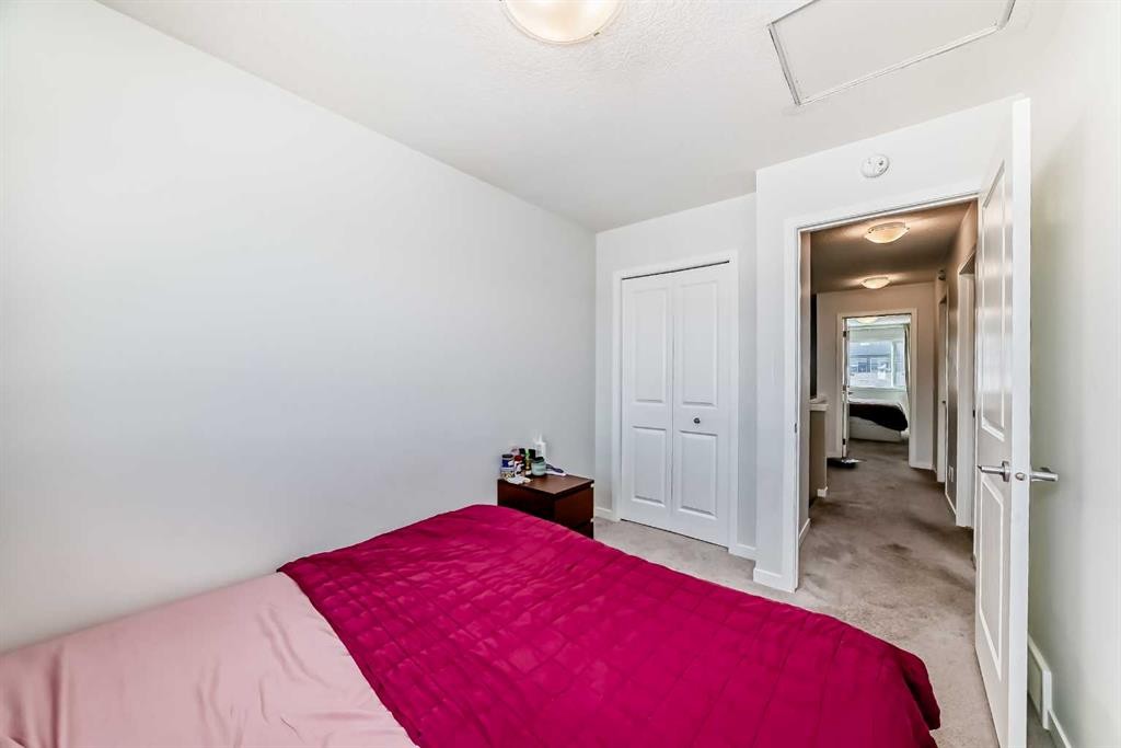 455 Tekarra Drive Nw, Calgary, AB - Indoor Photo Showing Bedroom
