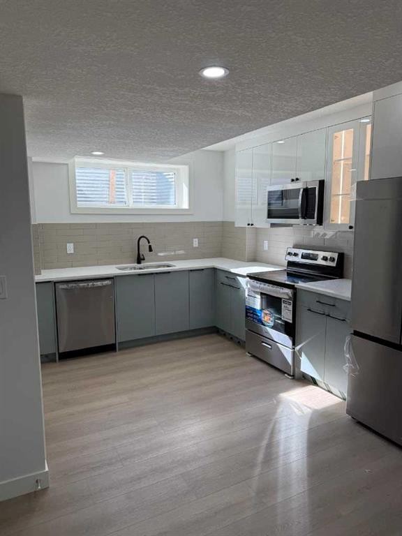 455 Tekarra Drive Nw, Calgary, AB - Indoor Photo Showing Kitchen With Stainless Steel Kitchen With Upgraded Kitchen