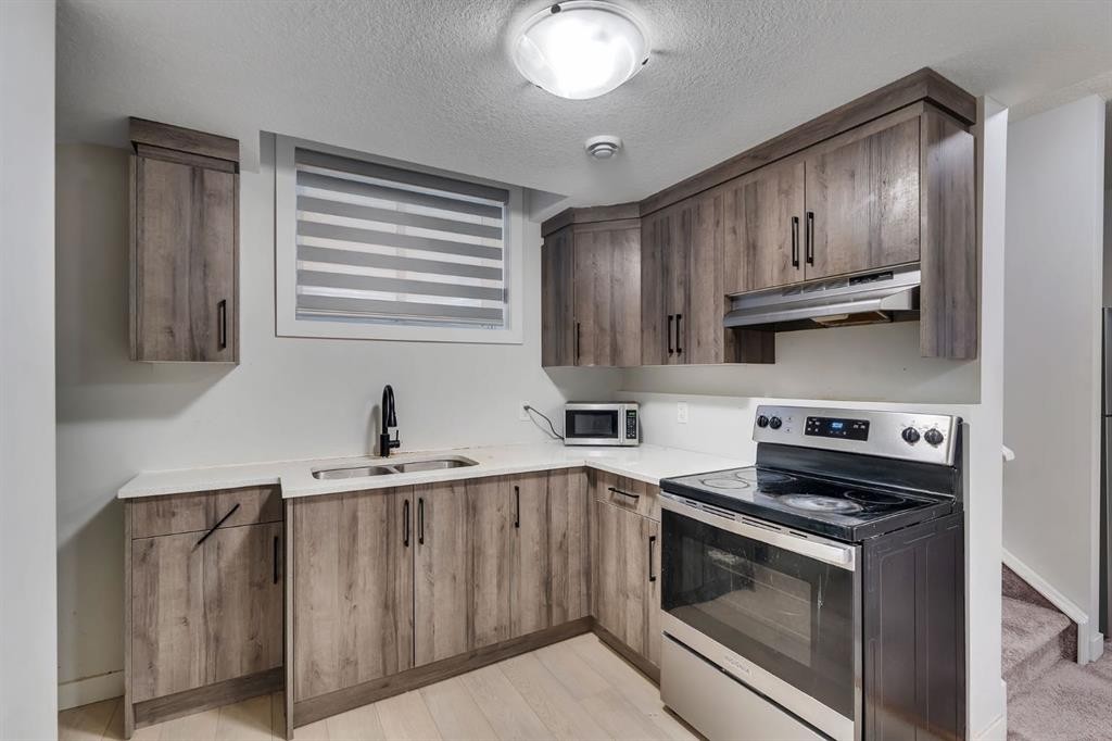 3608 Cornerstone Boulevard Ne, Calgary, AB - Indoor Photo Showing Kitchen With Double Sink