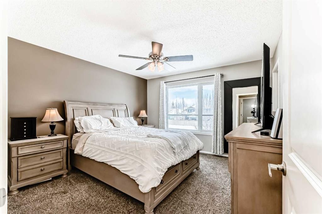 63 Chapalina Square Se, Calgary, AB - Indoor Photo Showing Bedroom