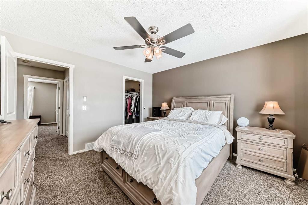 63 Chapalina Square Se, Calgary, AB - Indoor Photo Showing Bedroom