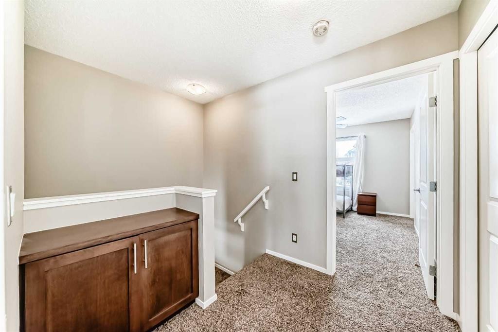 63 Chapalina Square Se, Calgary, AB - Indoor Photo Showing Other Room