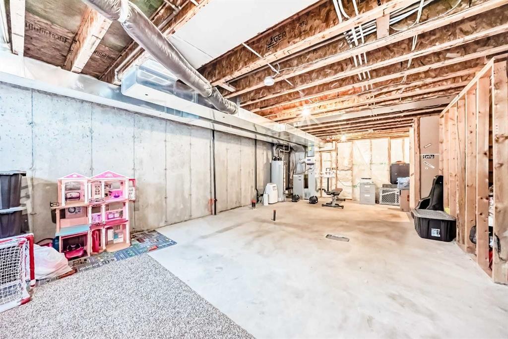 63 Chapalina Square Se, Calgary, AB - Indoor Photo Showing Basement