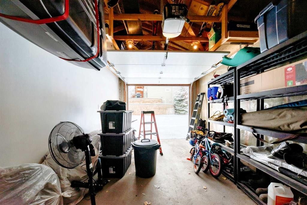 63 Chapalina Square Se, Calgary, AB - Indoor Photo Showing Garage