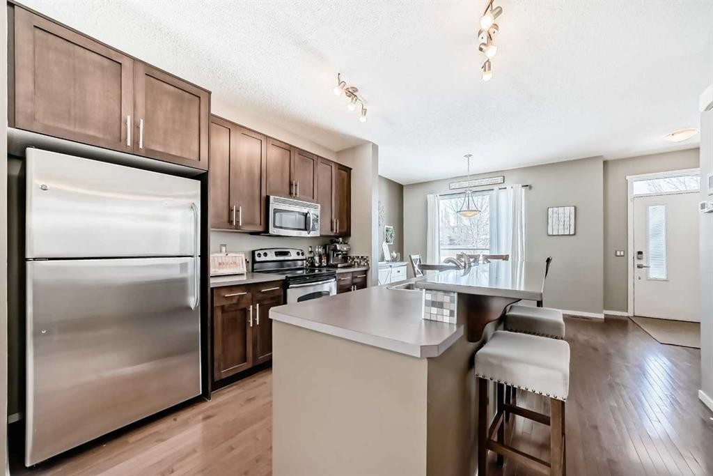 63 Chapalina Square Se, Calgary, AB - Indoor Photo Showing Kitchen With Stainless Steel Kitchen