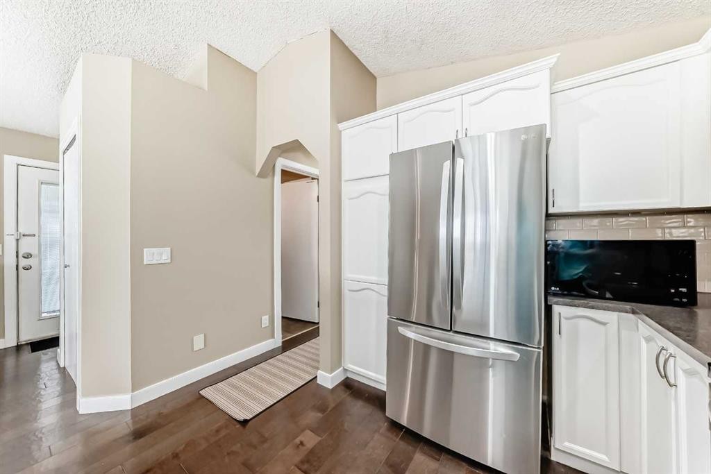 67 Bridleglen Manor Sw, Calgary, AB - Indoor Photo Showing Kitchen With Stainless Steel Kitchen