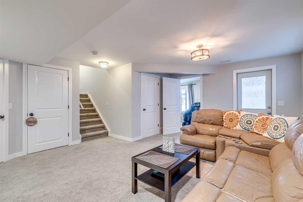 447 Tuscany Ridge Heights Nw, Calgary, AB - Indoor Photo Showing Living Room