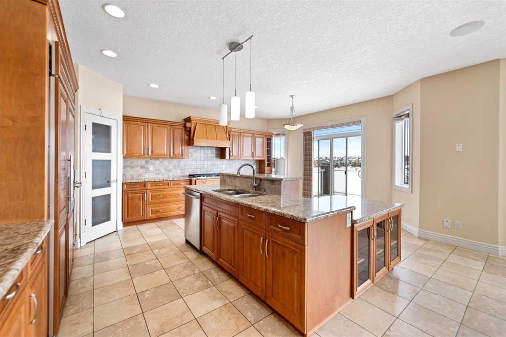 28 Panatella Manor Nw, Calgary, AB - Indoor Photo Showing Kitchen With Double Sink