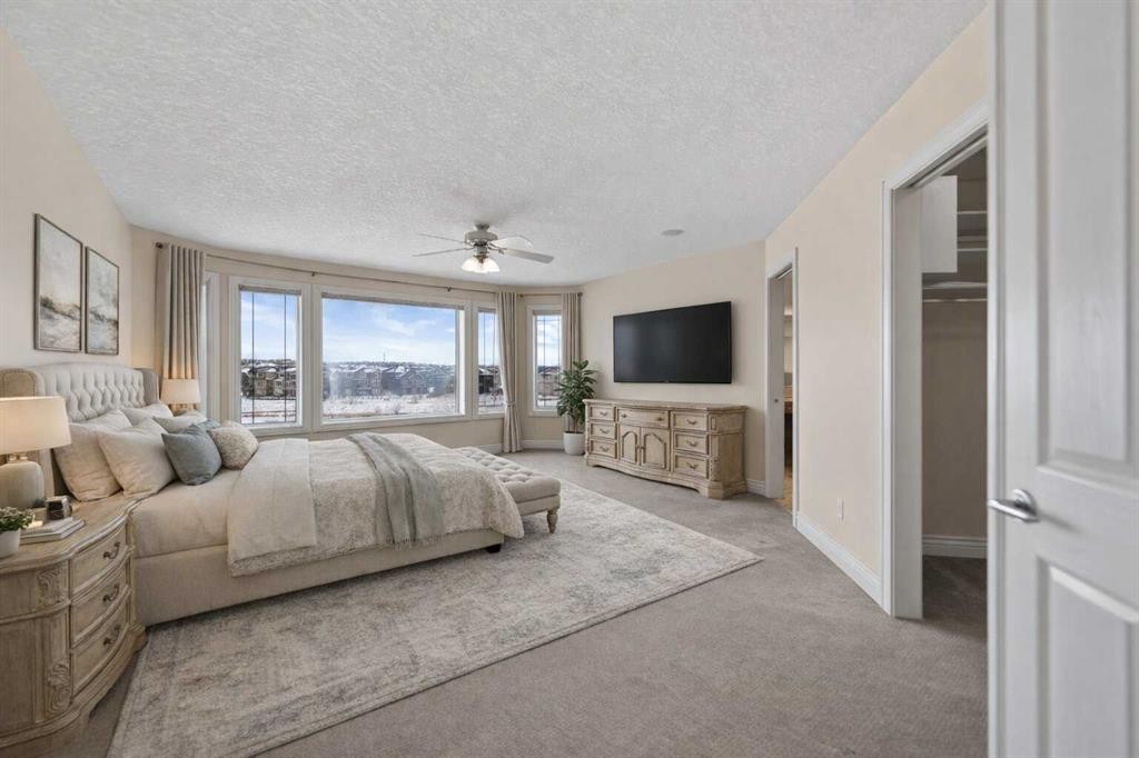 28 Panatella Manor Nw, Calgary, AB - Indoor Photo Showing Bedroom