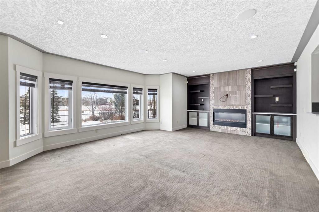 28 Panatella Manor Nw, Calgary, AB - Indoor With Fireplace