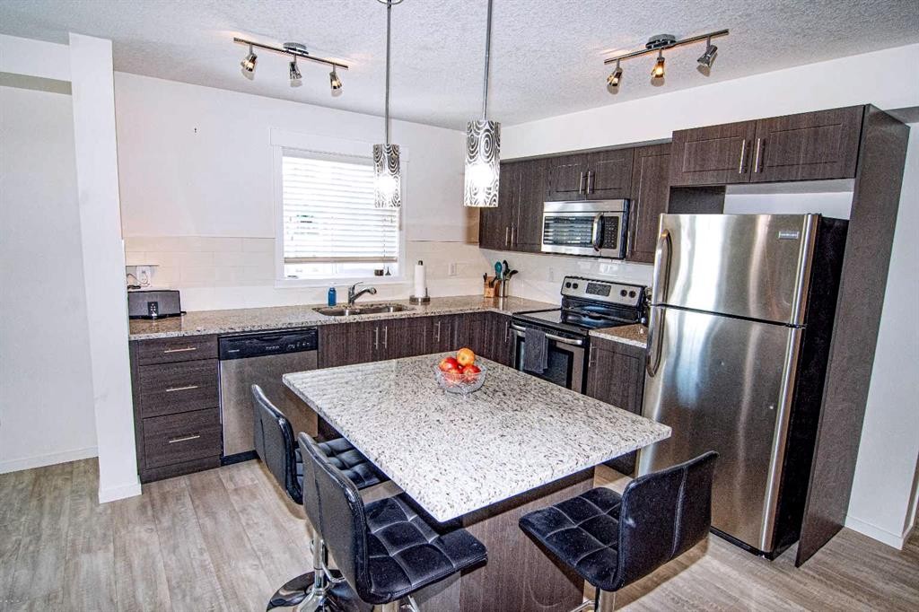 4311-99 Copperstone Park, Calgary, AB - Indoor Photo Showing Kitchen With Upgraded Kitchen