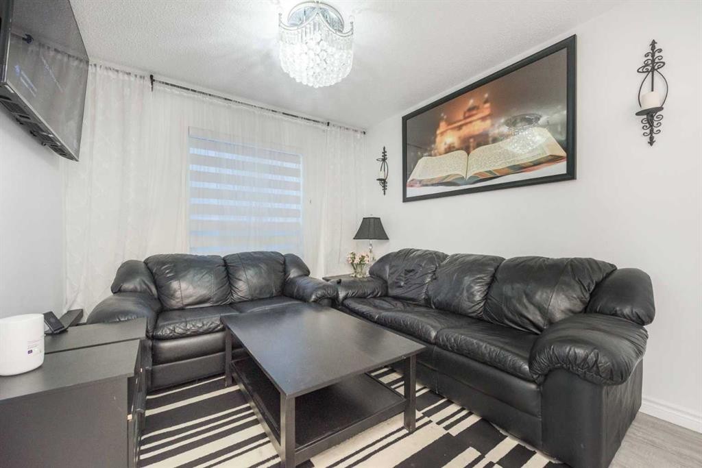 8430 Saddleridge Drive Ne, Calgary, AB - Indoor Photo Showing Living Room