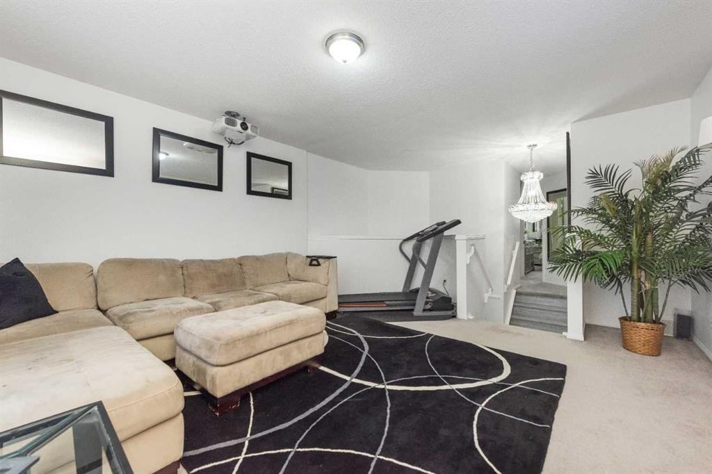 8430 Saddleridge Drive Ne, Calgary, AB - Indoor Photo Showing Living Room