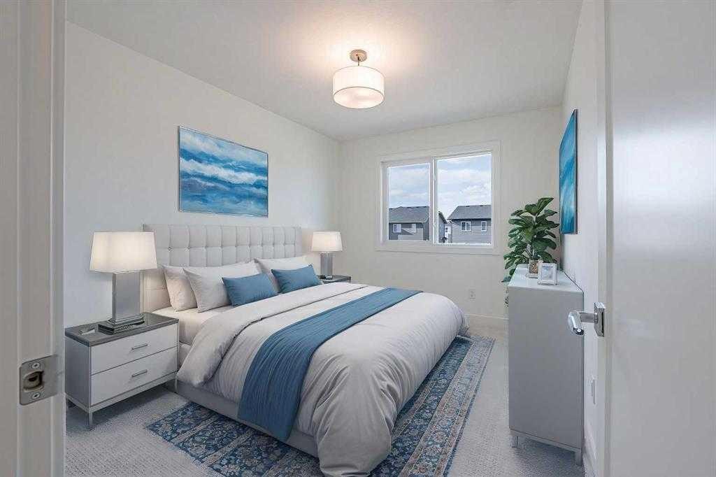 129 Dawson Wharf View, Chestermere, AB - Indoor Photo Showing Bedroom