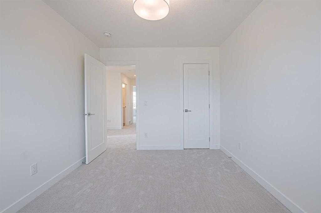 129 Dawson Wharf View, Chestermere, AB - Indoor Photo Showing Other Room