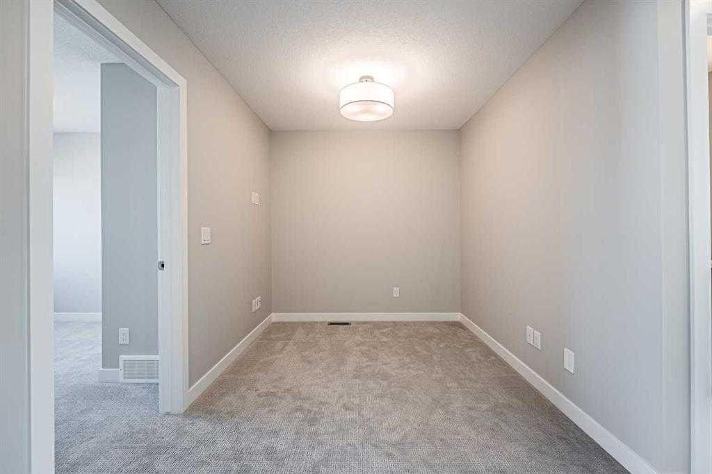 129 Dawson Wharf View, Chestermere, AB - Indoor Photo Showing Other Room