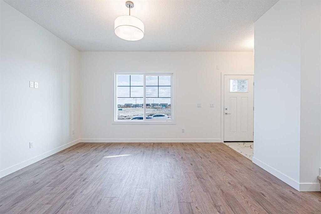 129 Dawson Wharf View, Chestermere, AB - Indoor Photo Showing Other Room