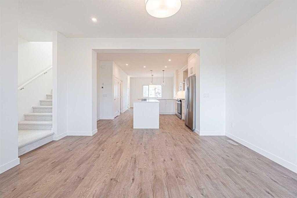 129 Dawson Wharf View, Chestermere, AB - Indoor Photo Showing Other Room