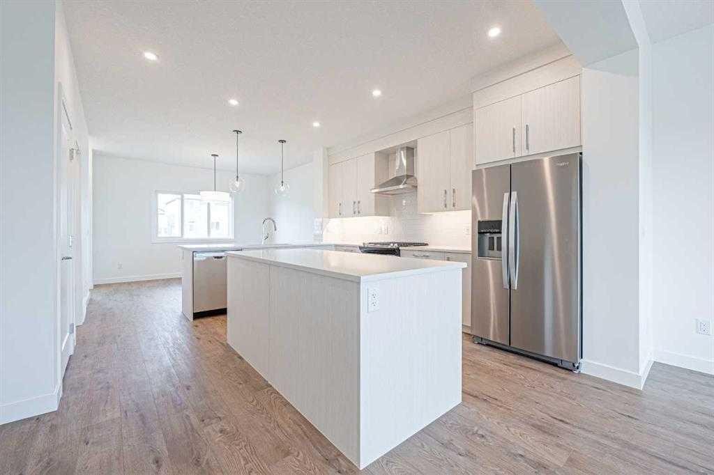 129 Dawson Wharf View, Chestermere, AB - Indoor Photo Showing Kitchen With Upgraded Kitchen