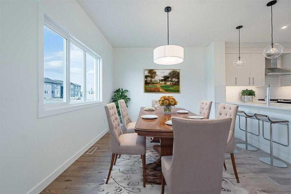 129 Dawson Wharf View, Chestermere, AB - Indoor Photo Showing Dining Room
