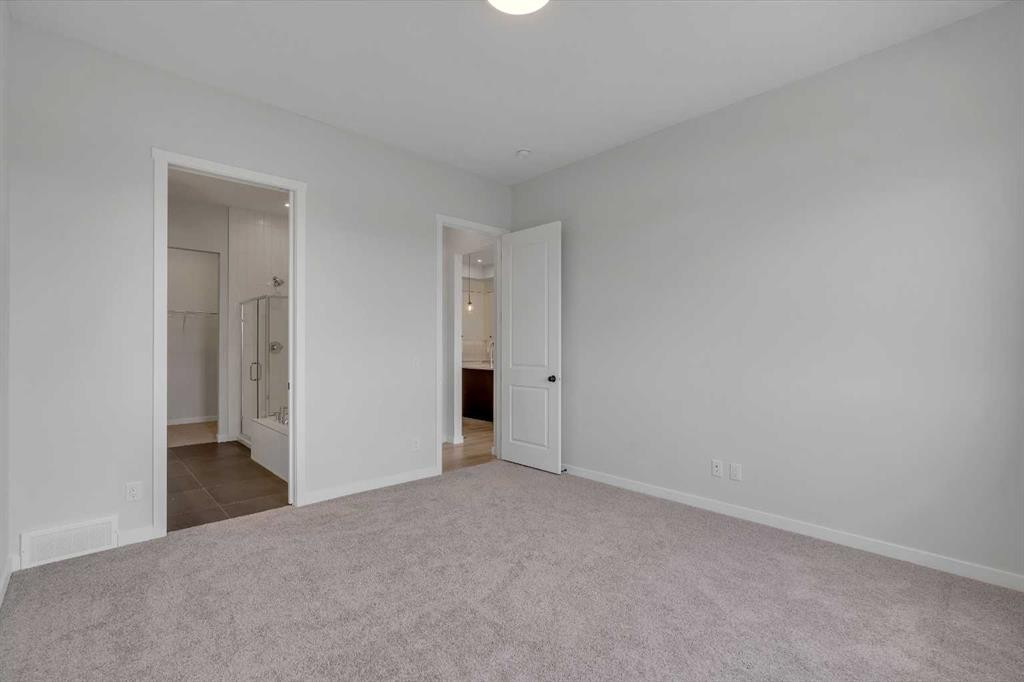 63 Bartlett Crescent Se, Calgary, AB - Indoor Photo Showing Other Room