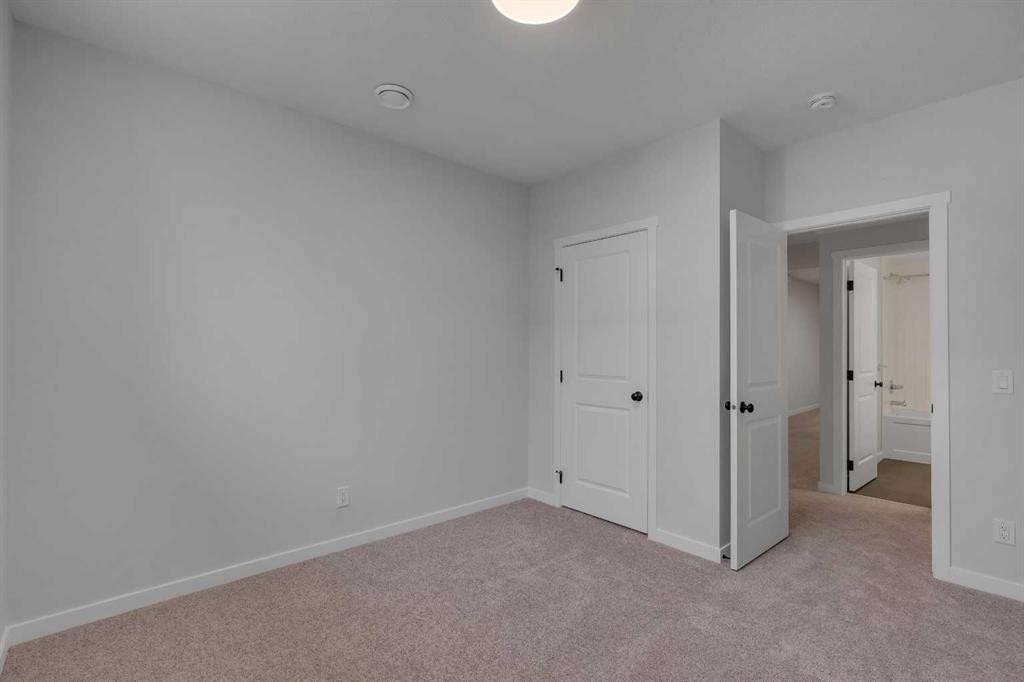 63 Bartlett Crescent Se, Calgary, AB - Indoor Photo Showing Other Room