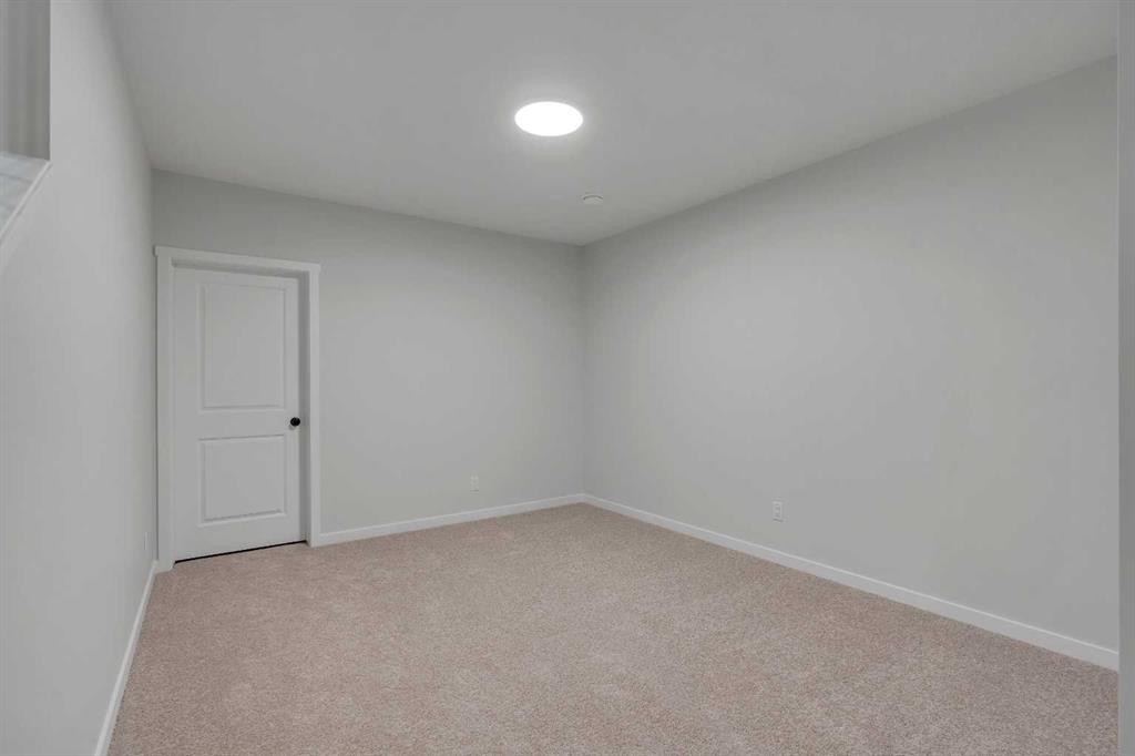 63 Bartlett Crescent Se, Calgary, AB - Indoor Photo Showing Other Room
