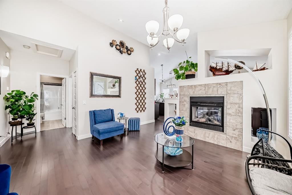 612 Montgomery Close Se, High River, AB - Indoor With Fireplace