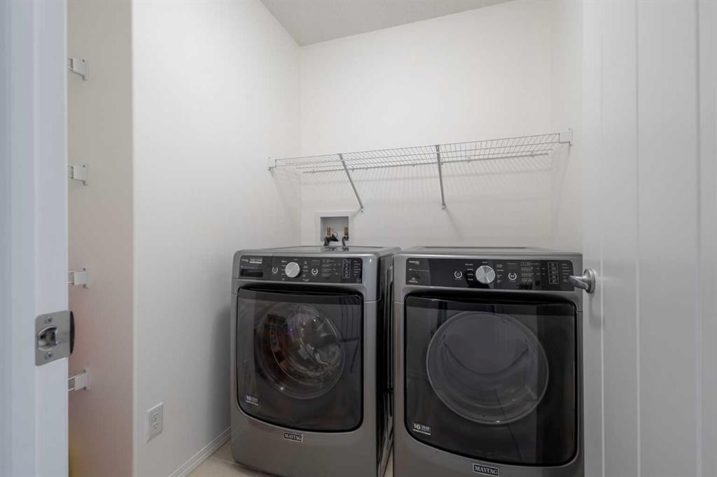 182 Auburn Sound Close Se, Calgary, AB - Indoor Photo Showing Laundry Room