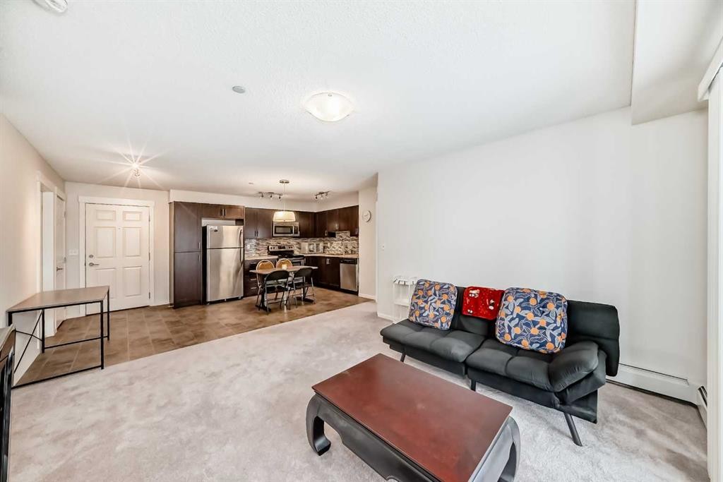 4308-279 Copperpond Common Se, Calgary, AB - Indoor Photo Showing Living Room