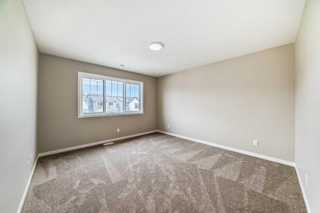 1085 Sawgrass Link Nw, Airdrie, AB - Indoor Photo Showing Other Room
