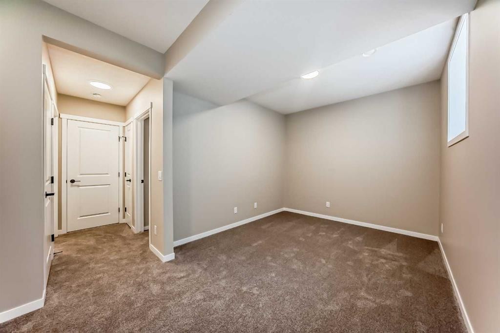 1085 Sawgrass Link Nw, Airdrie, AB - Indoor Photo Showing Other Room