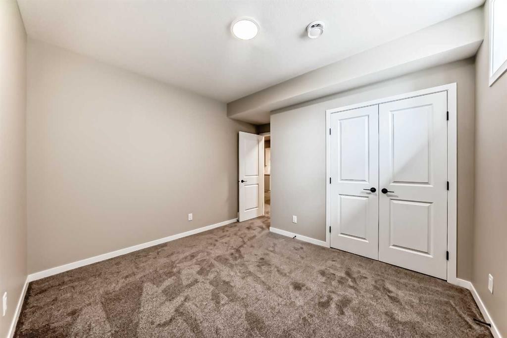 1085 Sawgrass Link Nw, Airdrie, AB - Indoor Photo Showing Other Room