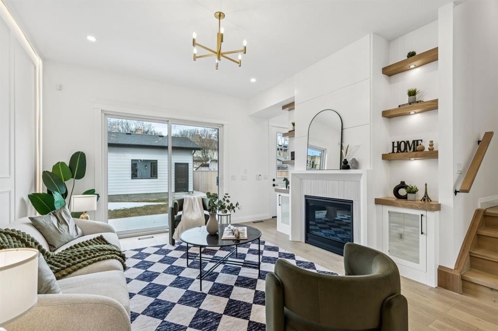 525 32 Street Nw, Calgary, AB - Indoor Photo Showing Living Room With Fireplace