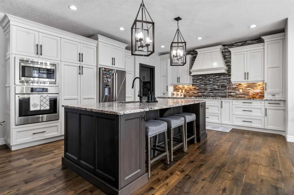264 Stonemere Close, Chestermere, AB - Indoor Photo Showing Kitchen With Upgraded Kitchen