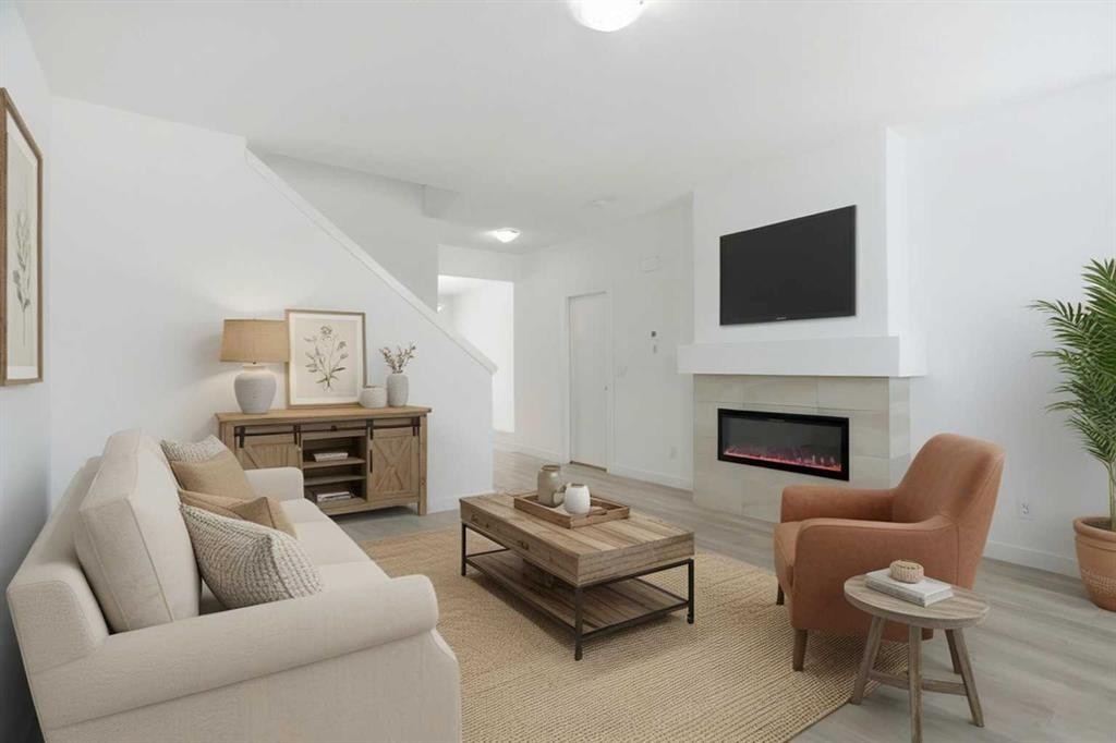 438 Copperstone Manor Se, Calgary, AB - Indoor Photo Showing Living Room With Fireplace