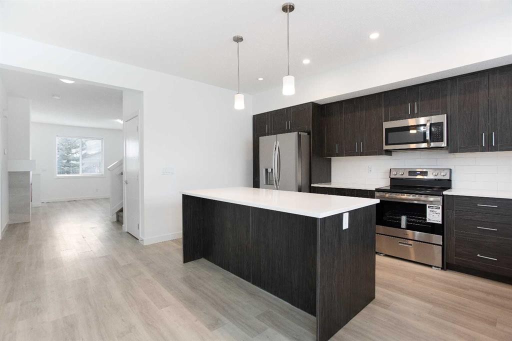 438 Copperstone Manor Se, Calgary, AB - Indoor Photo Showing Kitchen With Stainless Steel Kitchen With Upgraded Kitchen