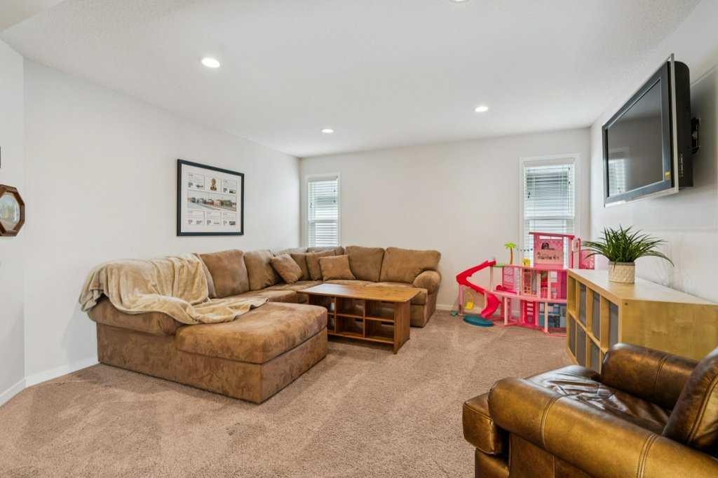 1173 Brightoncrest Common Se, Calgary, AB - Indoor Photo Showing Living Room
