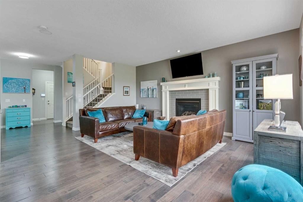 55 Sage Bluff Green Nw, Calgary, AB - Indoor Photo Showing Living Room With Fireplace