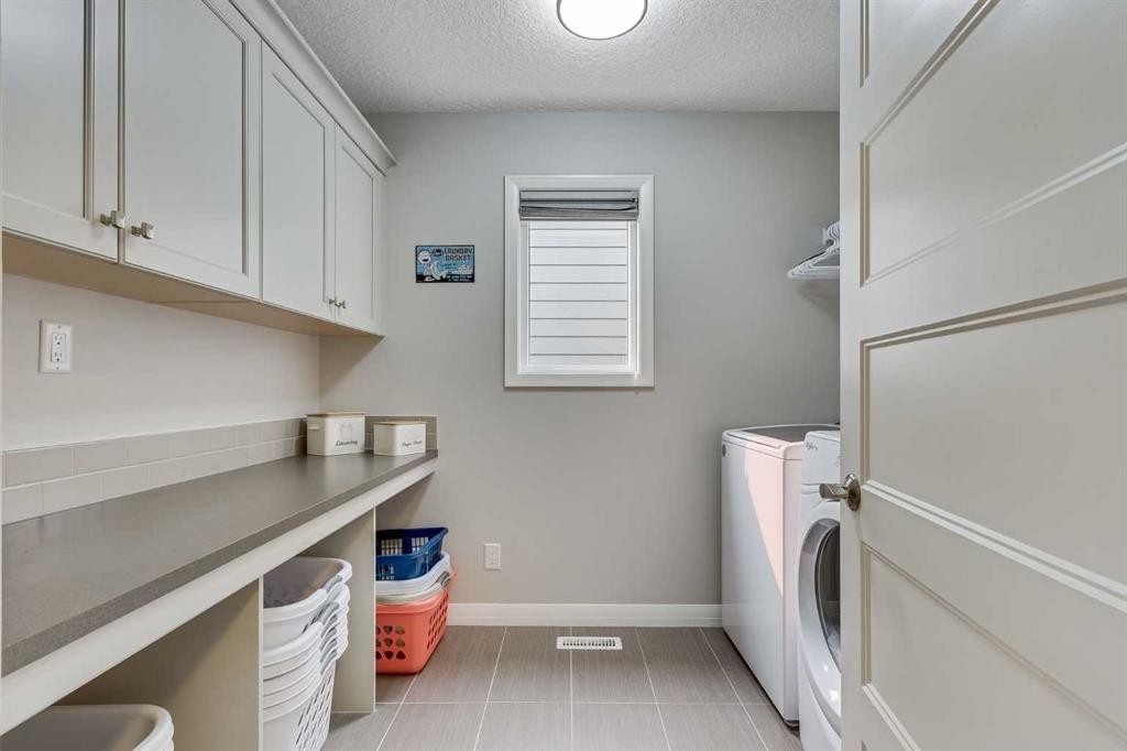 55 Sage Bluff Green Nw, Calgary, AB - Indoor Photo Showing Laundry Room